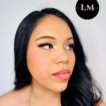 Soft social makeup portrait with lashes and warm tones