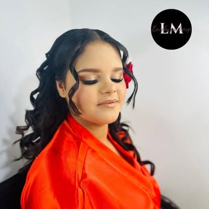 XV soft glam makeup with curled hairstyle